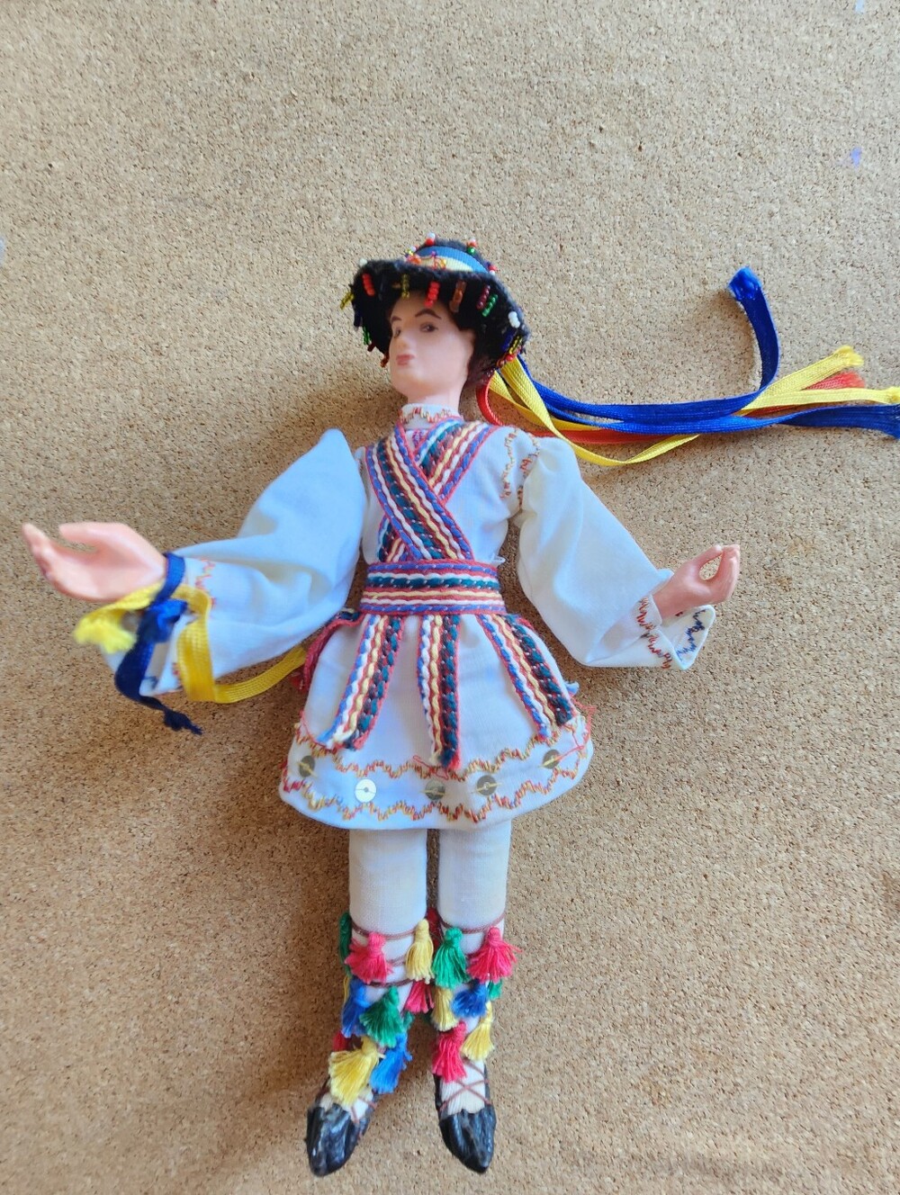 Colorful Eastern European Folk Doll with Tassel Accents